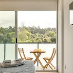 Premium With Balcony, Pool & Garage By Hostwise *